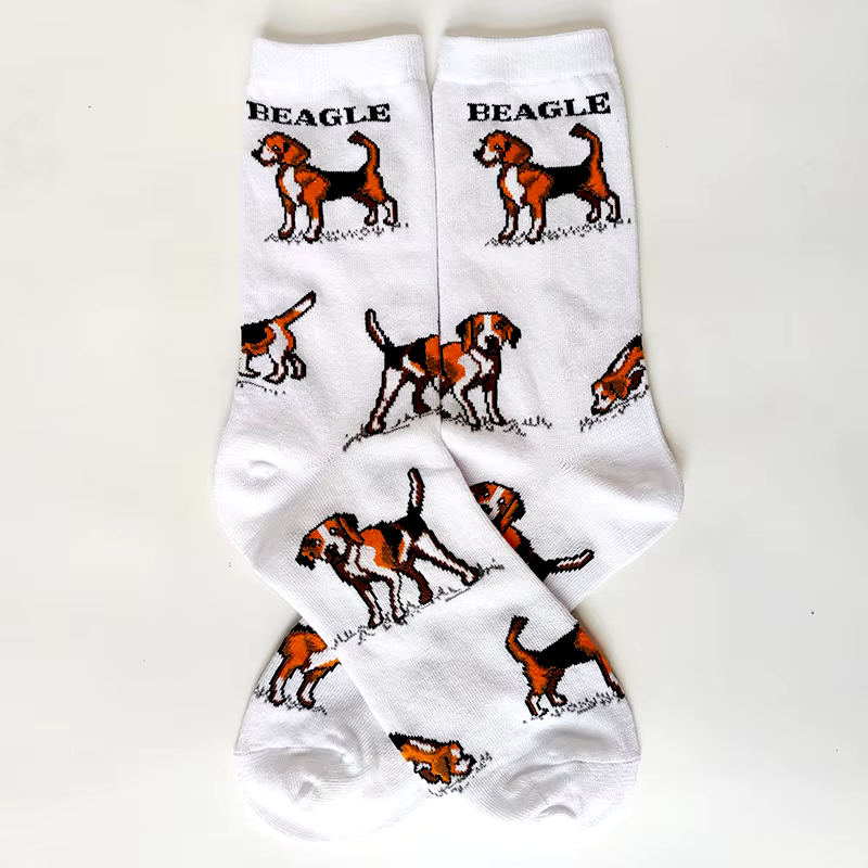 White socks with beagle illustrations on a white background