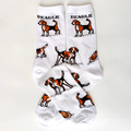 White socks with beagle illustrations on a white background