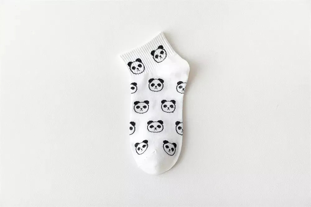 White sock with black panda pattern on a white background